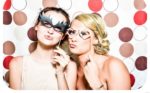 women in photo booth